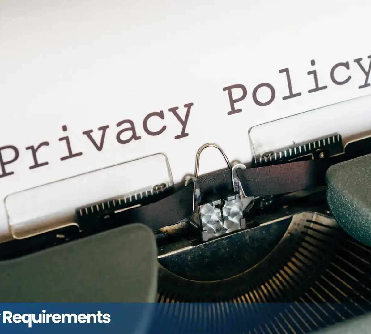 Typewriter displaying “Privacy Policy” for an article explaining privacy policy requirements and compliance.